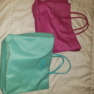 Teal and Pink Lancome bags